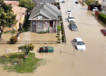Latest California storm leaves at least two dead, breaks levee