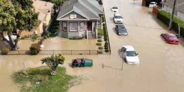 Latest California storm leaves at least two dead, breaks levee