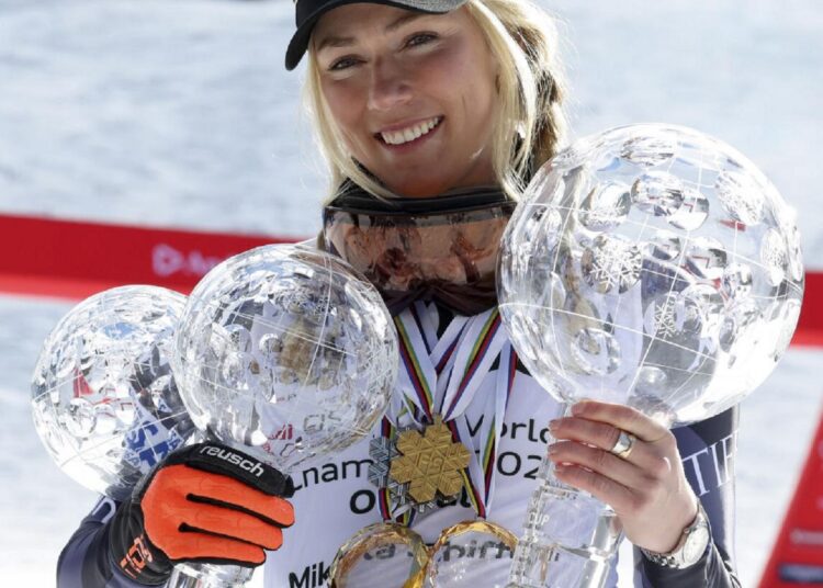 Shiffrin ends season with record 21st GS win 1 - Egyptian Gazette United States' Mikaela Shiffrin poses with her trophies for the alpine ski, World Cup giant slalom in Soldeu, Andorra.