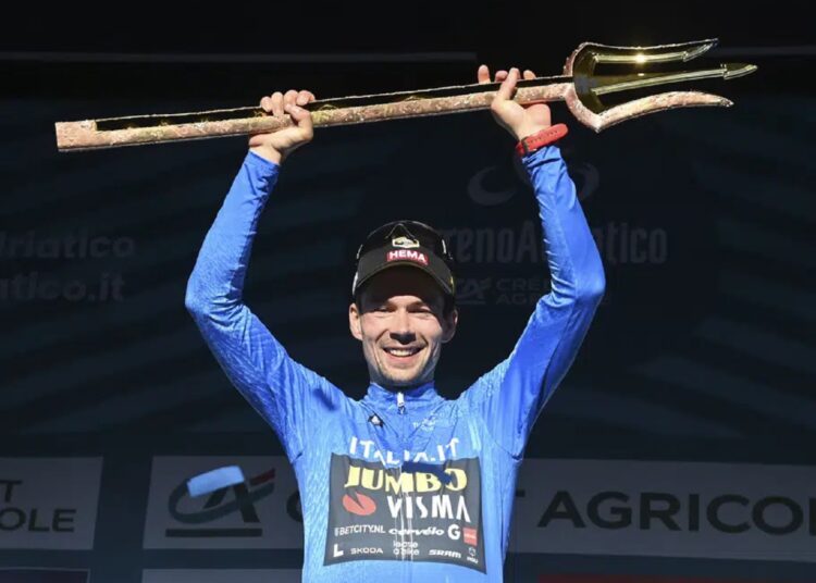 Primoz Roglic poses with the trophy of the 2023 Tirreno-Adriatico.