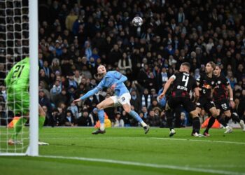 Haaland hits five to ease Man City into Champions League quarters