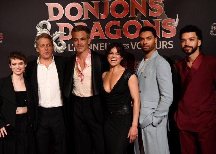 From left: Sophia Lillis, Hugh Grant, Chris Pine, Michelle Rodriguez, Rege-Jean Page and Justice Smith at the premiere of the film ‘Dungeons and Dragons: Honor Among Thieves’ in Paris.