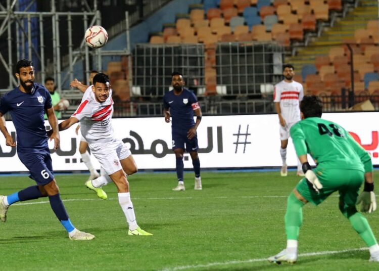 Zamalek’s midfielder Nabil Emad “Dunga” (2nd L) tries to score against Enppi during their match in the Egyptian Premier League.