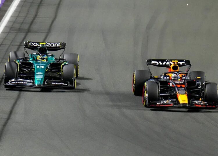 Perez grabs Saudi Arabia GP 1 - Egyptian Gazette Red Bull driver Sergio Perez of Mexico (R) takes over Aston Martin driver Fernando Alonso of Spain during the Saudi Arabia Formula One Grand Prix.