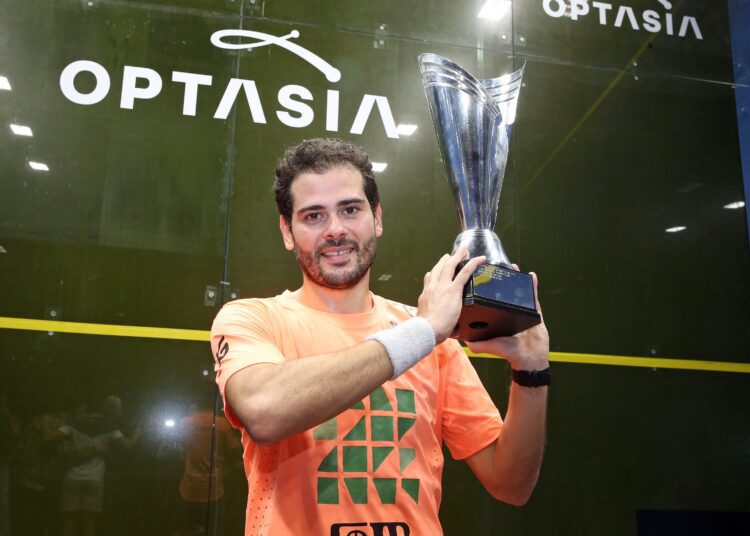 Karim Abdel Gawad poses with Optasia Squash Championships title.