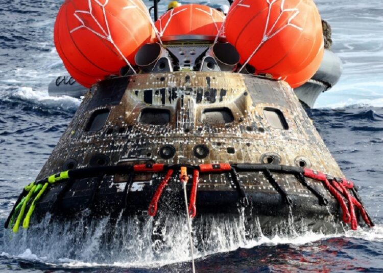 NASA to reveal crew members in April for flight around Moon 1 - Egyptian Gazette NASA's Orion space capsule being retrieved after splashing down in the Pacific Ocean.