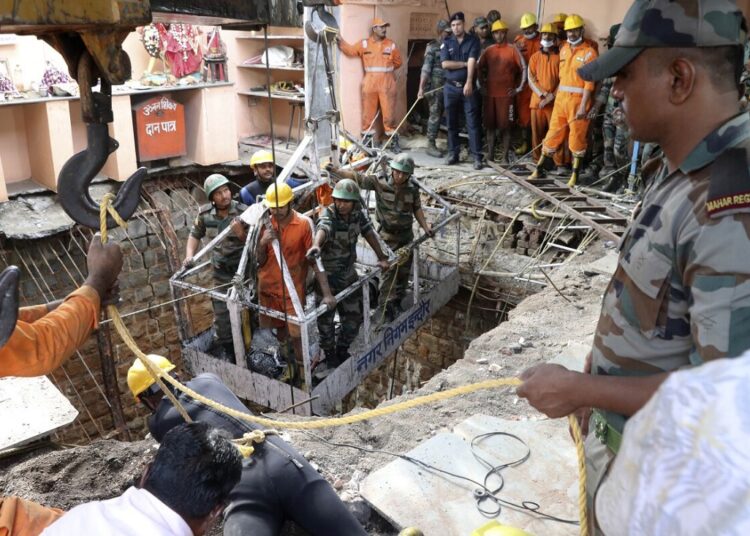36 bodies found inside well after collapse at Indian temple 1 - Egyptian Gazette Rescuers work at the site of a structure built over an old temple well that collapsed Thursday as a large crowd of devotees gathered for the Ram Navami Hindu festival, in Indore, India, Friday, March 31, 2023