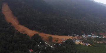 Indonesia landslide deaths climb to 21; dozens still missing