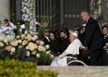 Pope, big crowd mark Easter in flower-adorned Vatican square