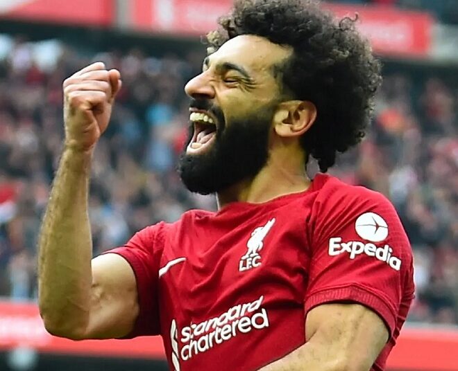 Mohamed Salah celebrates after scoring Liverpool's decisive third goal.