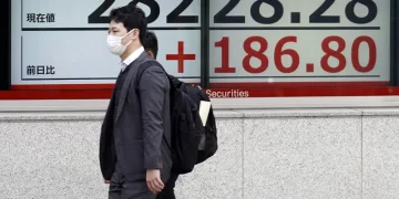 Oil prices soar on producer output cuts; World shares higher