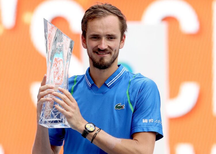 Daniil Medvedev poses with his 19th ATP Tour title at the Miami Open.