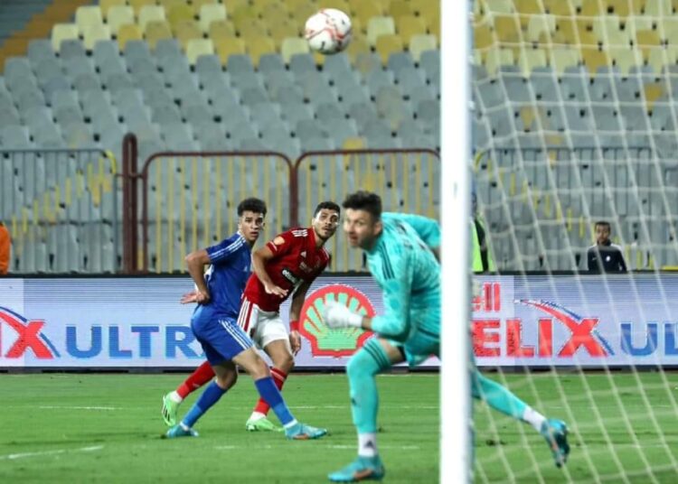Al-Ahly’s forward Mohamed Sherif (C) scores his side’s first goal against Smouha during an Egyptian Premier League match.