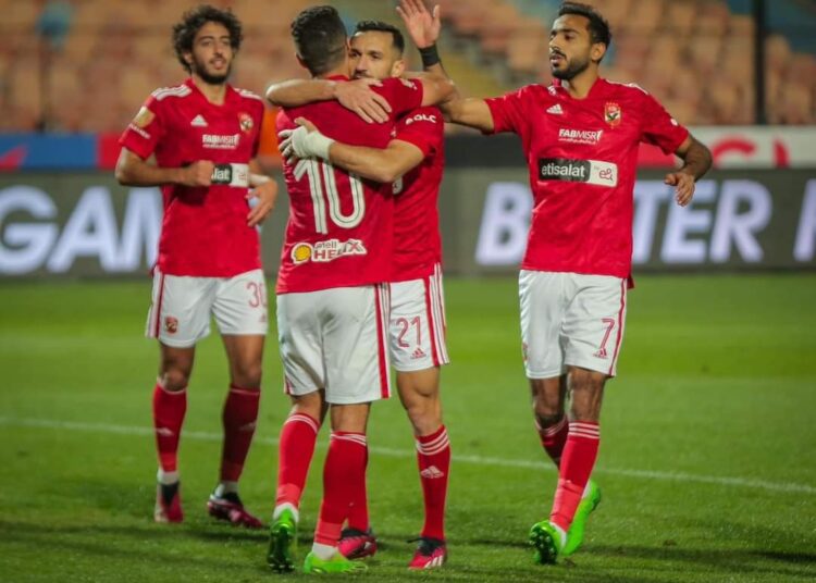 Al-Ahly’s players celebrate after scoring against Pharco FC at Cairo International Stadium.