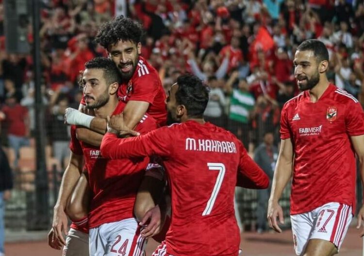 Al-Ahly’s players celebrate after scoring against Raja Casablanca during a CAF Champions League quarter-final first-leg in Cairo.