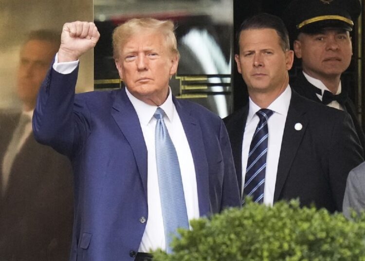 Trump answers questions for 7 hours in NY fraud lawsuit 1 - Egyptian Gazette Former President Donald Trump gestures as he leaves Trump Tower in New York.