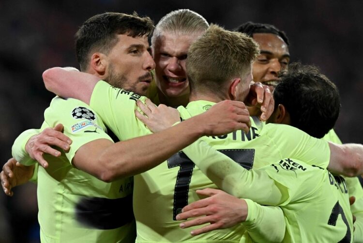 Exhausted City could not celebrate Bayern triumph, says Guardiola 1 - Egyptian Gazette Manchester City's Erling Haaland celebrates with teammates after scoring a goal against Bayern Munich April 19, 2023.