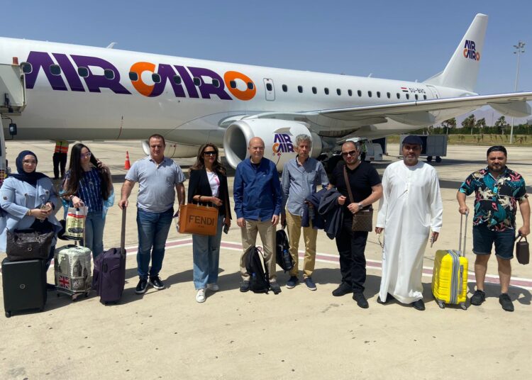 The Emirati delegation posing for a group photo after its arrival at Sharm el-Sheikh airport on board the Air Cairo flight.