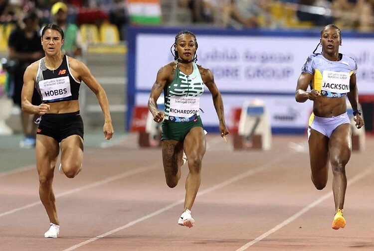 New Zealand's Zoe Hobbs (L), Sha'Carri Richardson of the US and Jamaica's Shericka Jackson in action during the women's 100m at the Diamond League meeting of the season in Doha.