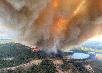 Out-of-control wildfires in western Canada forces 25,000 people to flee homes