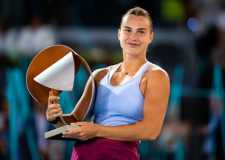 Belarus' Aryna Sabalenka poses with the Madrid Open trophy after beating Poland's Iga Swiatek in final.