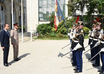 Defense minister back home after official visit to France