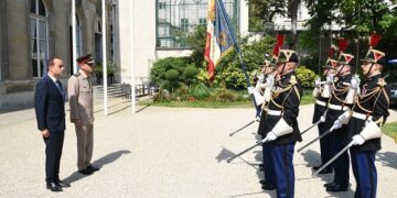 Defense minister back home after official visit to France