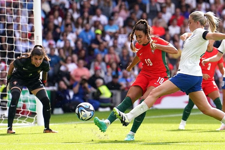 England captain Alessia Russo (1stR) tries to score against Portugal’s goalkeeper Ines Pereira.