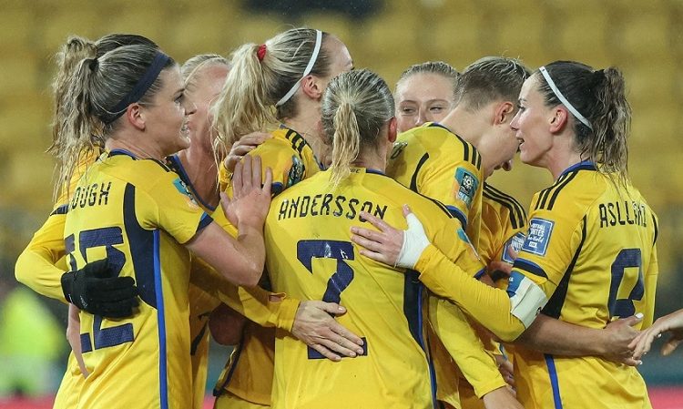 Sweden's players celebrate after scoring during the Women's World Cup Group G match against South Africa in Wellington, Sunday, July 23, 2023.