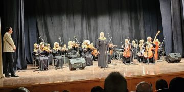Light and Hope orchestra performs in NMEC