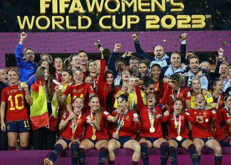 Spain’s players celebrate with the trophy after winning the Women’s World Cup in Sydney.