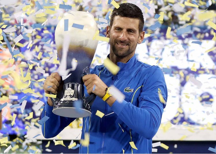 Novak Djokovic poses with the Cincinnati Open Cup after the victory over Carlos Alcaraz during the men’s singles final match.