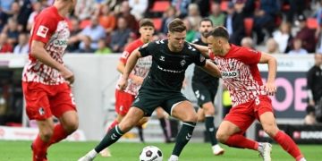 Dortmund signs Bundesliga top scorer