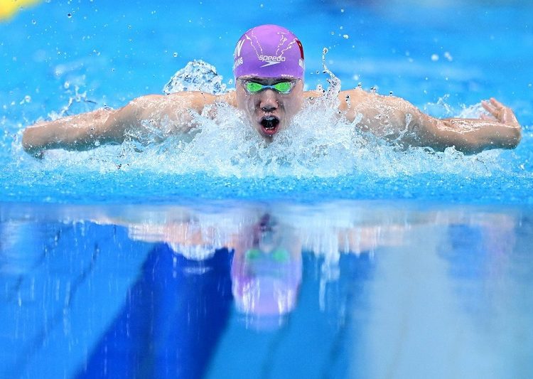 China in control as Qin sets new Asian Games mark 1 - Egyptian Gazette China’s Qin Haiyang competes in the men’s 200m individual medley heat.