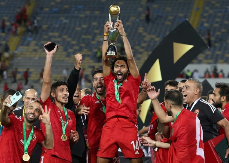 Al-Ahly, Wydad could meet in 1st African League final 1 - Egyptian Gazette Al-Ahly players pose with the CAF Champions League trophy after defeating Wydad Casablanca of Morocco in the 2023 final.