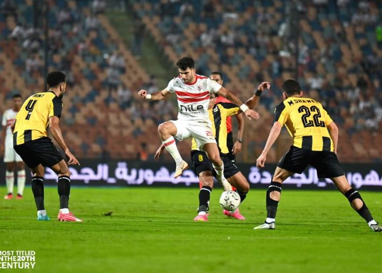 Egyptian Premier League: Pyramids win, Zamalek held 1 - Egyptian Gazette Zamalek’s winger Ahmed Sayed ‘Zizo’ (C) vies for the ball against Arab Contractors’ players during their tie at the Egyptian Premier League.