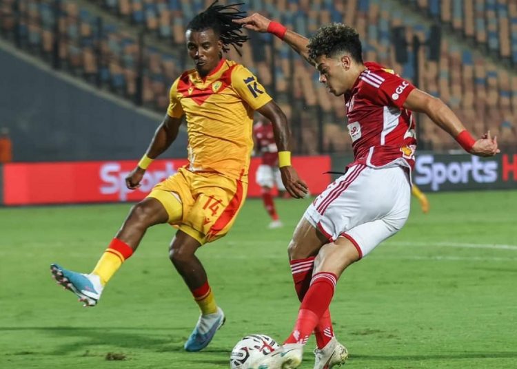 Al-Ahly’s midfielder Emam Ashour (R) controls the ball against Saint George’s player during their CAF Champions League tie.
