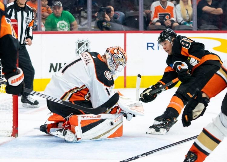 Anaheim Ducks' Ryan Strome (R) shoots the puck past Philadelphia Flyers' Samuel Ersson for a goal during an NHL hockey game, in Philadelphia.