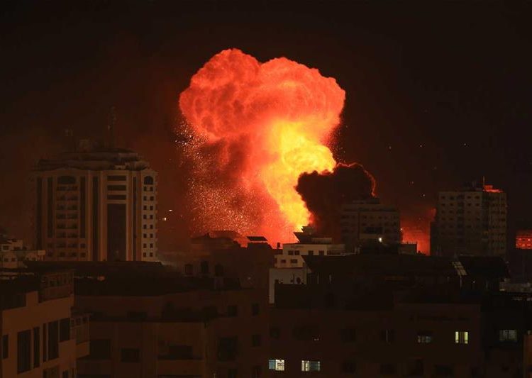 A fireball erupts during Israeli bombardment of Gaza City.
