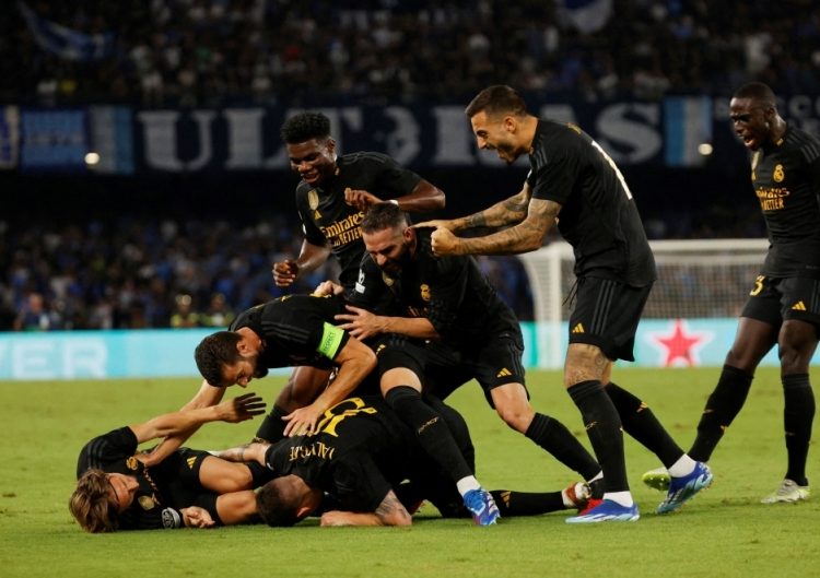 Real Madrid fight back to win five-goal thriller at Napoli 1 - Egyptian Gazette
