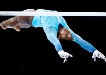 Biles makes history at world gymnastics