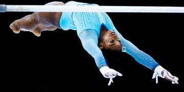 Biles makes history at world gymnastics