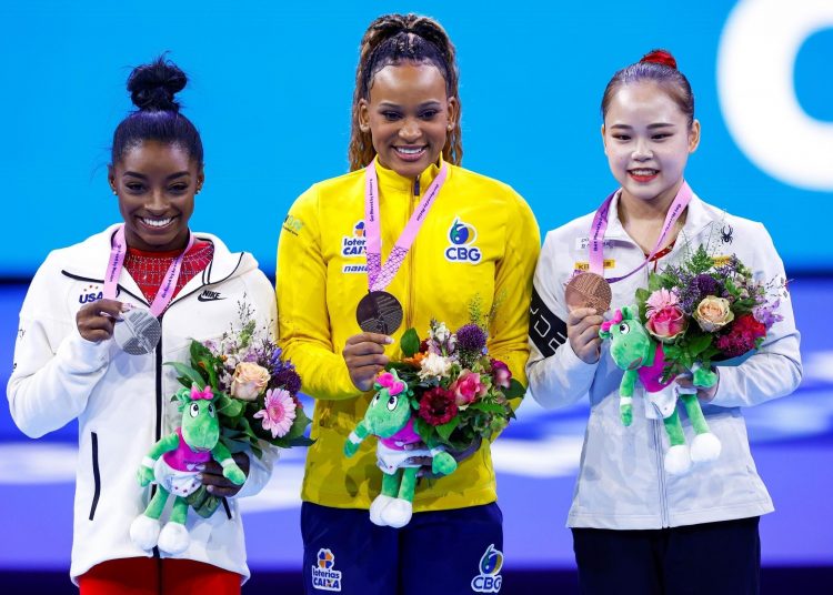 (From L) American Simone Biles took world vault silver behind Brazil's Rebeca Andrade with South Korea's Yeo Seo-jeong third.