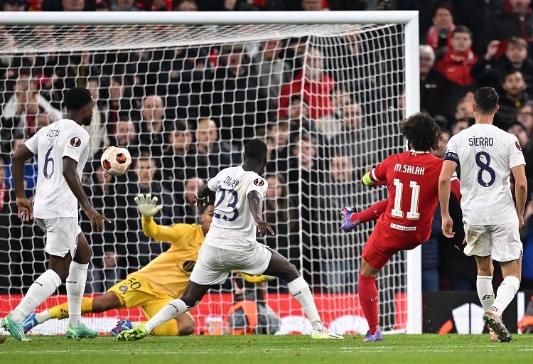 Liverpool's Egyptian striker Mohamed Salah (11) scores the team's fifth goal during the UEFA Europa League Group E match against Toulouse at Anfield.