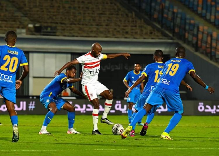 Zamalek’s captain Mahmoud Abdel-Razek ‘Shikabala’ (C) controls the ball against Djibouti’s Arta Solar players.