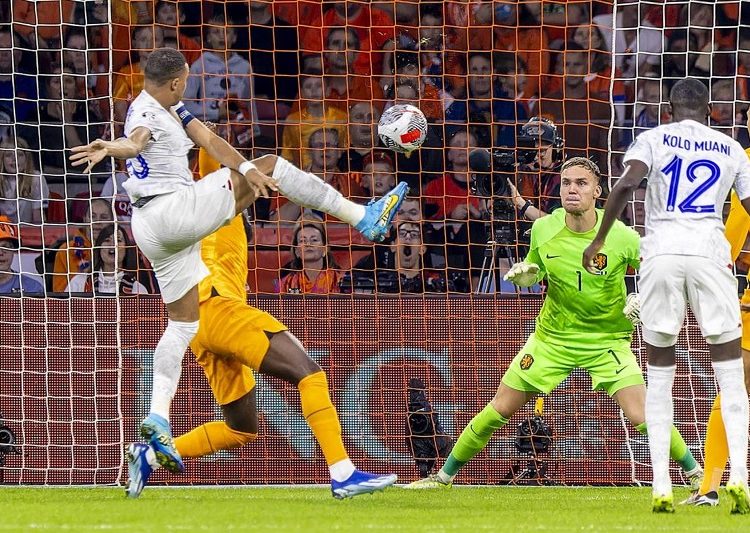 Kylian Mbappe scores 2 as France beats Netherlands 2-1 to qualify for European Championship.