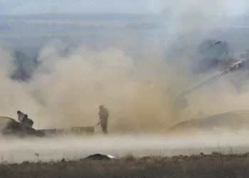 Palestinians rush to buy food and struggle under strikes as Israel readies possible ground operation