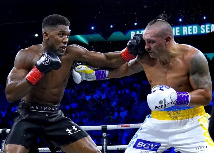 Oleksandr Usyk (R) defended Anthony Joshua by split decision to retain his three heavyweight world titles in August 21, 2022 in Jeddah.