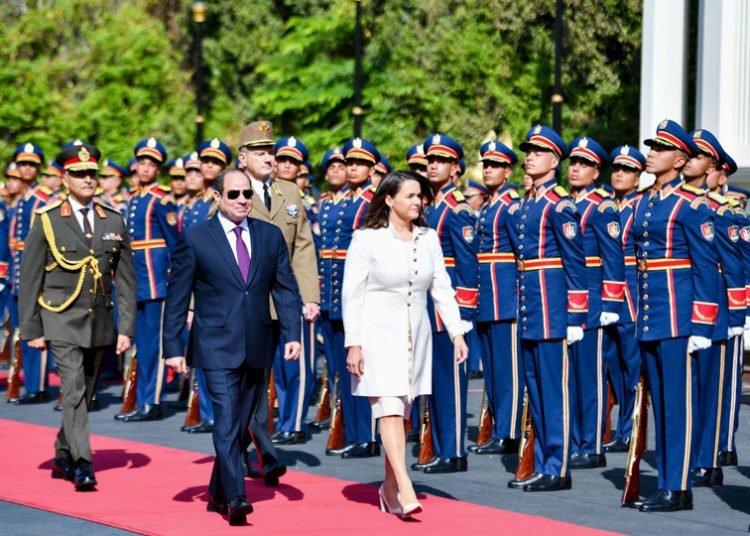 Sisi asserts importance of achieving permanent ceasefire in Gaza, largest flow of relief aid 1 - Egyptian Gazette President Abdel Fattah El Sisi and Hungarian President Katalin Novák reviewing the guard of honour ahead of their talks in Cairo on Monday.