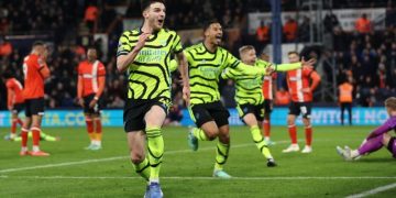 Arsenal go five clear as Rice seals seven-goal thriller at Luton